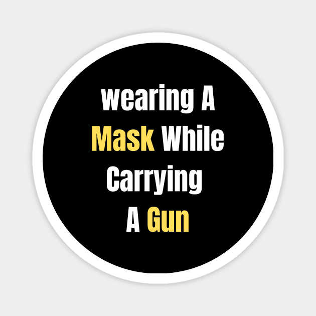 Wearing A MASK WHILE CARRYING A GUN Magnet by Giftadism